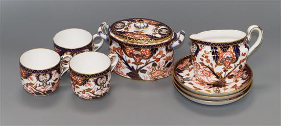 A Crown Derby eight piece part coffee set